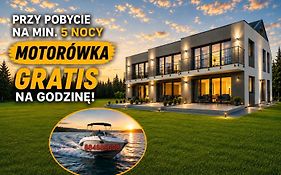 Złote Sady Apartamenty na Mazurach z widokiem na jezioro